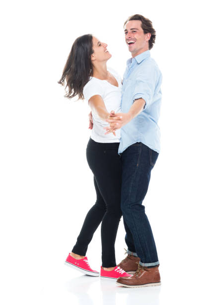 istock Attractive couple are happily dancing 1149893317
