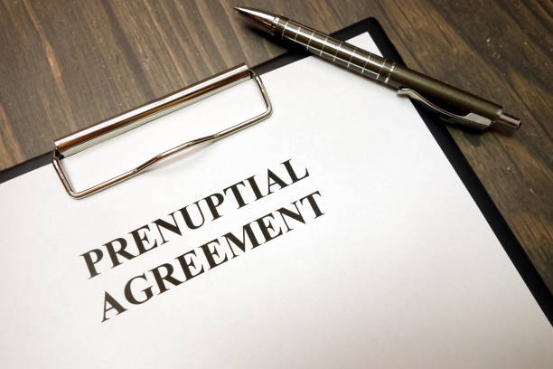 istock Clipboard with prenuptial agreement and pen on desk 1149893413