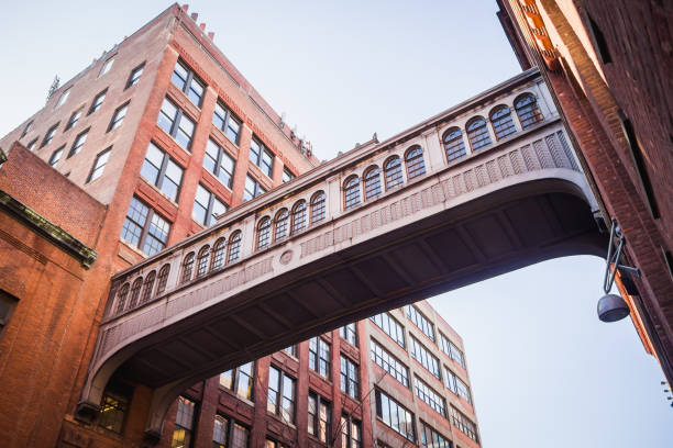Gateway bridge between two red brick buildings in the Chelsea neighborhood of New York stock photo