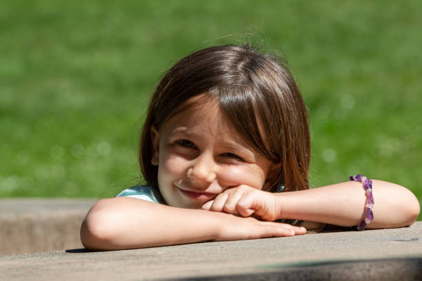 istock Smiling little girl looking at the camera 1149896169