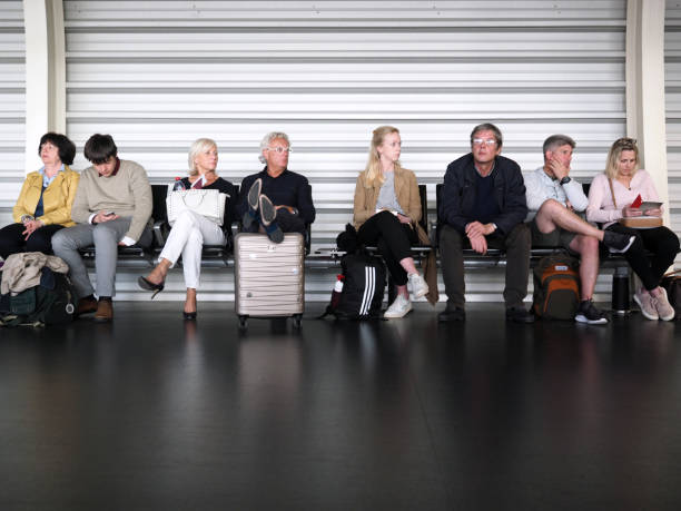 Amsterdam, Netherlands - April, 26, 2019: Travelers waiting for boarding at Schiphol airport