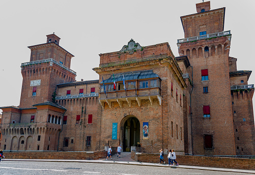 Ferrara, Emilia-Romagna, Italy - May 25, 2018: View of the facade of the Estense Castle in the historic center of the city, a World Heritage Site.