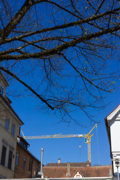 istock construction crane in historical city at april springtime 1149900096