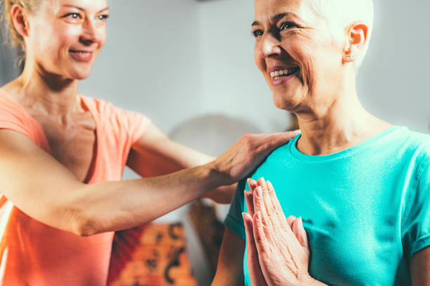 istock Senior woman on private yoga class 1149902319