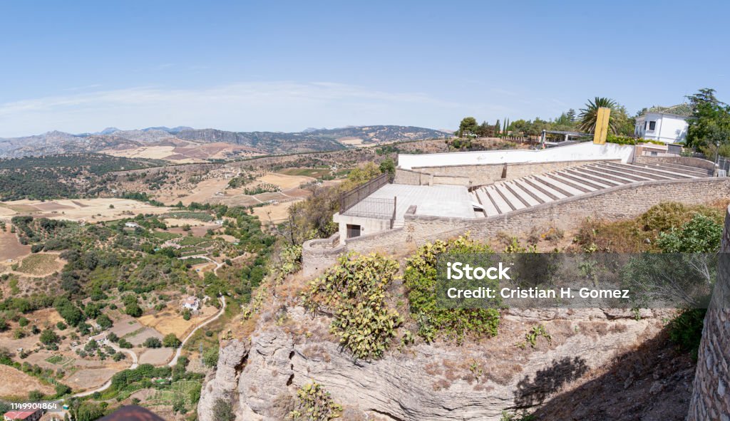 Vistas of the gorge, mountains and Puente Nuevo can be seen from this scenic viewpoint. Auditorium Blas Infante Andalusia Stock Photo