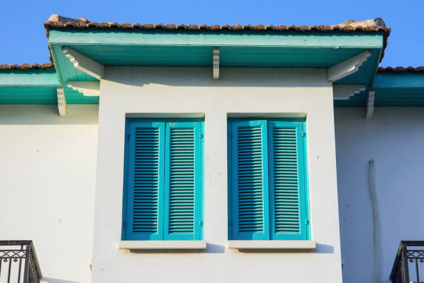 Sunny and colorful house detail with windows