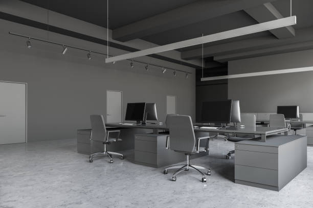 istock Corner of gray open space office with doors 1149906697