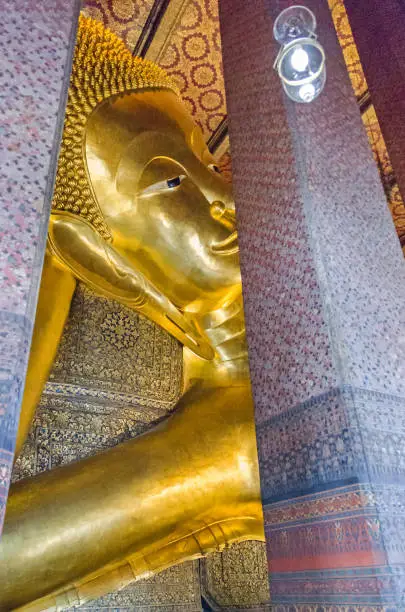 Photo of Reclining Buddha  in a Buddhist temple complex Wat Pho in Bangkok