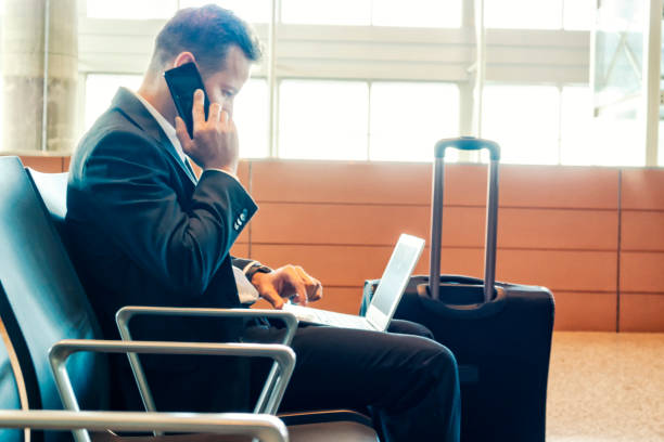istock Businessman at an airport. 1149909681
