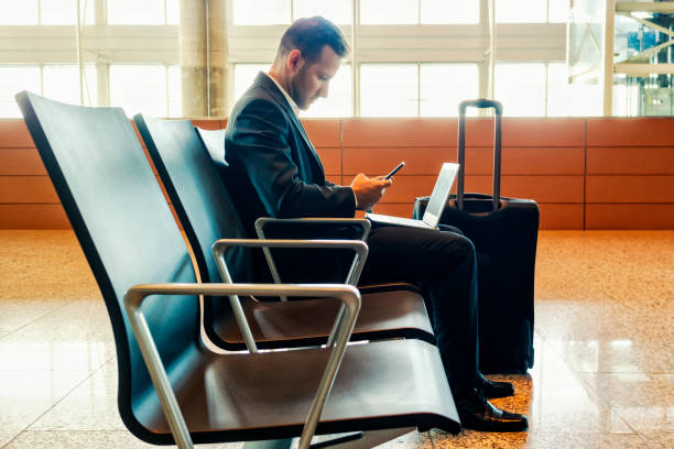 istock Businessman at an airport. 1149909923