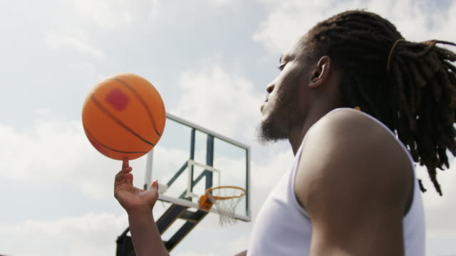 Basketball player playing with basketball 4k