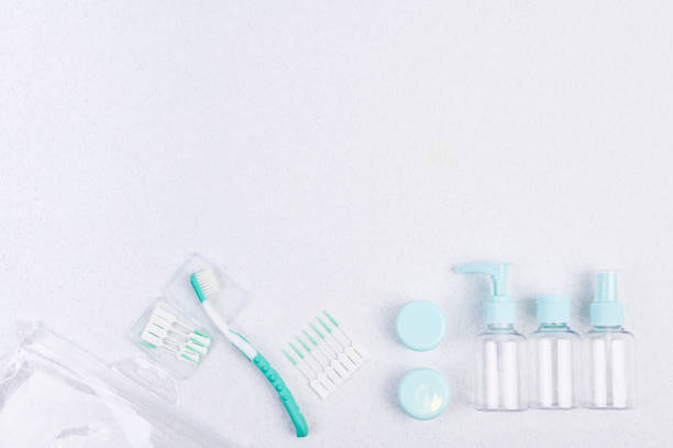 istock Toothbrush and plastic containers for travel on a white background and chopsticks. Flat lay. 1149912941