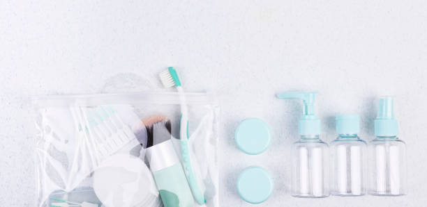 istock Plastic containers, toothbrush and makeup brush. Travel set on a white background. Flat lay. 1149912943