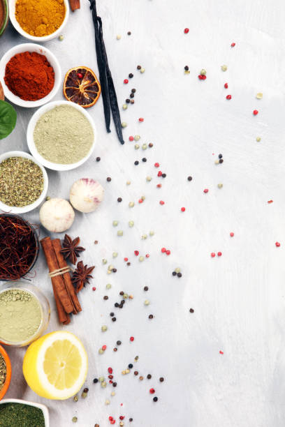 istock Spices and herbs on table. Food and cuisine ingredients with basil 1149914167