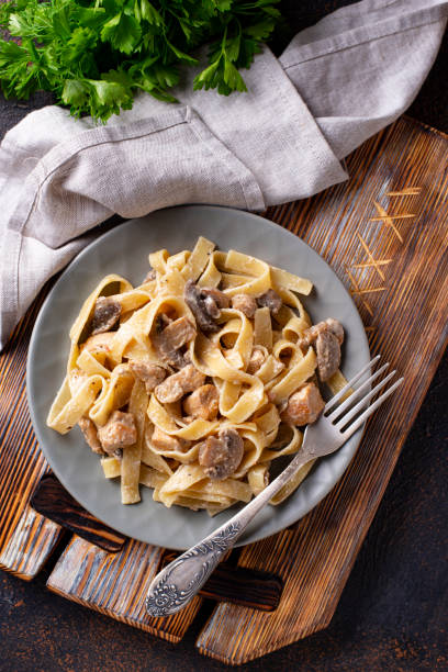 istock Pasta with chicken and mushroom 1149918120