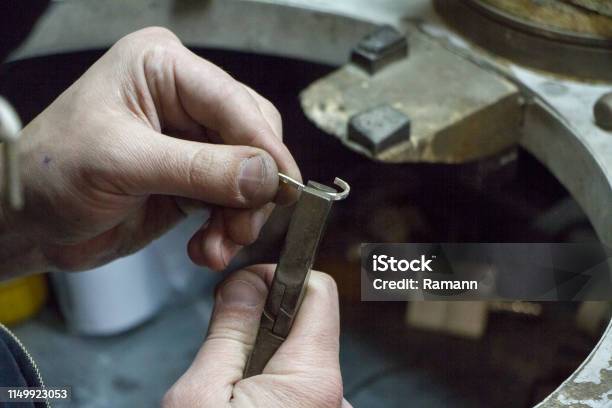 Male Shoemaker Placing A Double Cap Rivet With An Old Rivet Press Machine  Stock Photo - Download Image Now - iStock