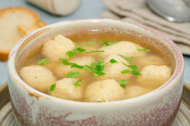 istock Homemade matzo ball soup. Dumpling chicken soup 1149932300