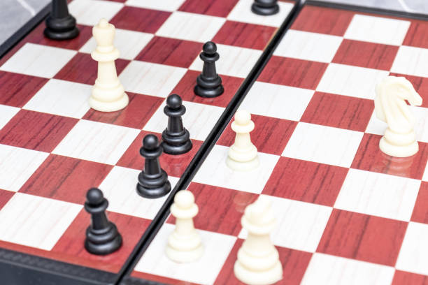 istock Chess board with figures on it close up, intellectual board games and hobby concept 1149933507