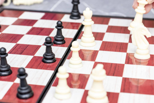 istock Chess board with figures on it close up, intellectual board games and hobby concept 1149933635
