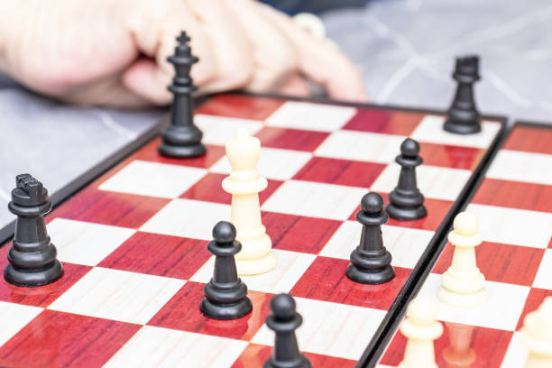 istock Chess board with figures on it close up, intellectual board games and hobby concept 1149933851