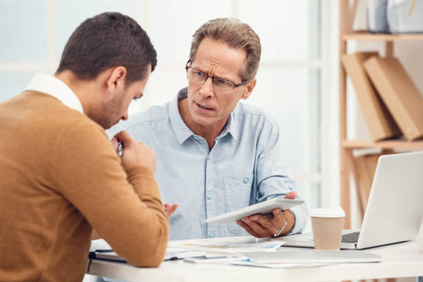 istock Two business men together in the office 1149933959