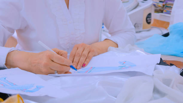 istock Fashion designer drawing design sketch 1149934914
