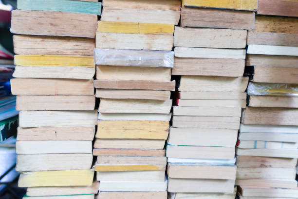 istock Stacked book on shelf for sell 1149942429