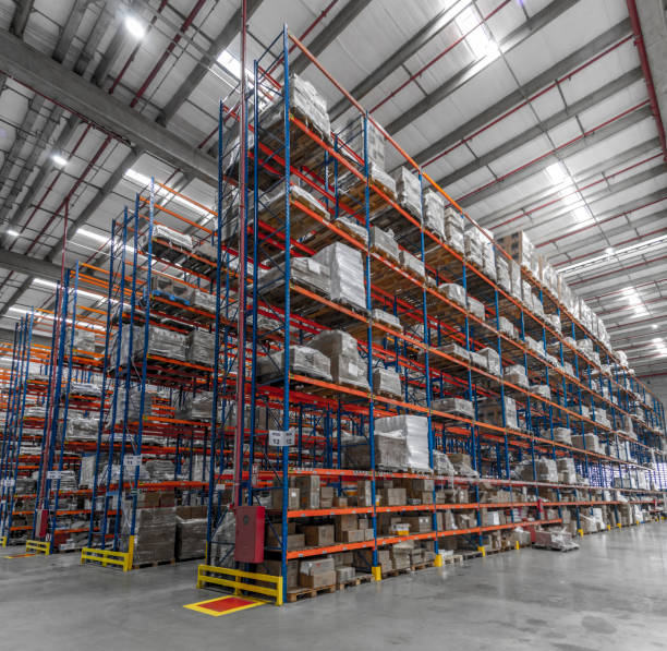 istock logistic shed and distribution boxes workers and forklift in operation 1149946195