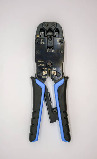 istock Tool for crimping and stripping of connectors, network cable. Equipment for installing lan cable. 1149955382
