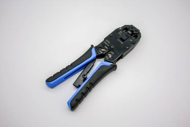 istock Tool for crimping and stripping of connectors, network cable. Equipment for installing lan cable. 1149955383