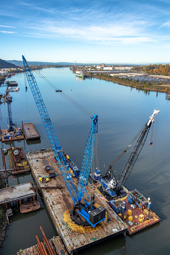 Floating cranes on the Willamette River in Portland, Oregon