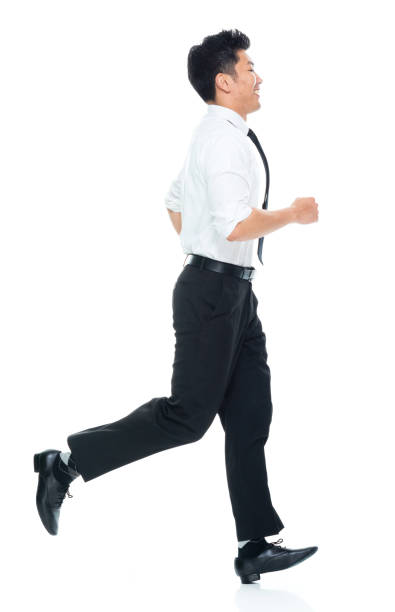 istock Handsome Asian Businessman - running 1149960827