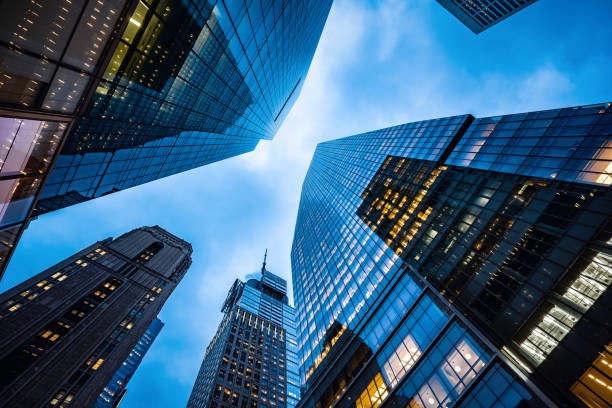 istock Low angle view of skyscrapers on an overcast day 1149960983