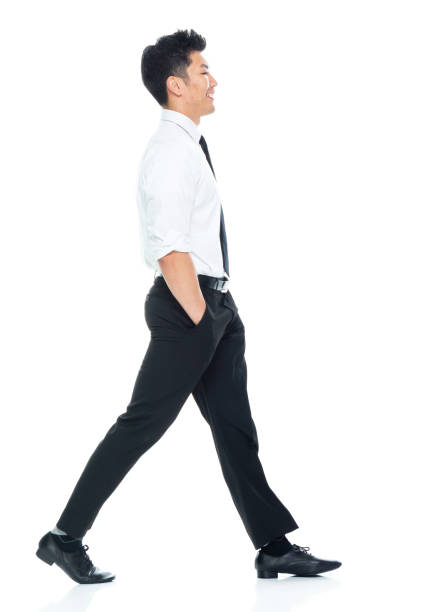 istock Handsome Asian Businessman - side view walking 1149961029