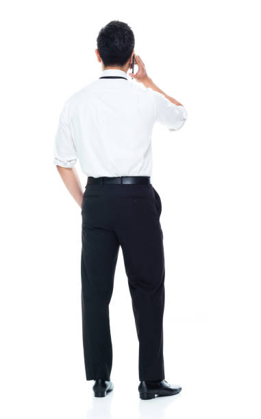 istock Handsome Asian Businessman - talking on smart phone 1149961272