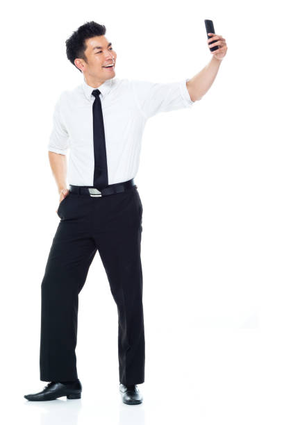 istock Handsome Asian Businessman - is taking selfie 1149961278