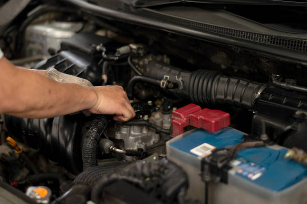 istock mechanic working car maintenance with soft-focus and over light in the background 1149997681