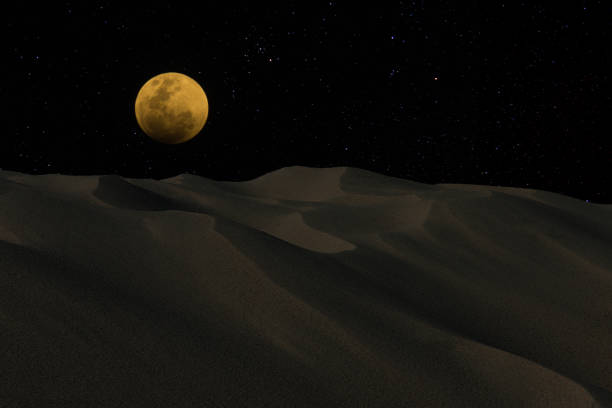 istock The desert with super blue blood lunar eclipse and star. 1150008124