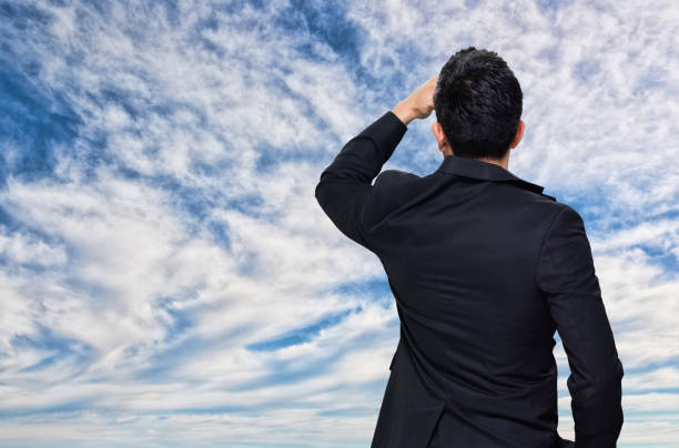 istock Asian / Chinese businessman - rear view searching 1150008794