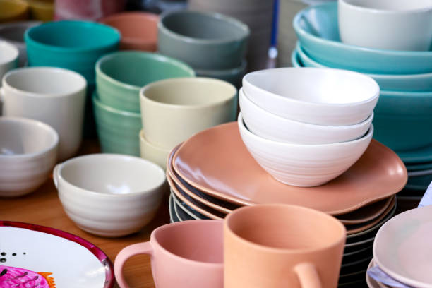 istock Close up of empty ceramic bowls and plates 1150018890