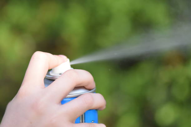 istock A girl spraying 1150019753