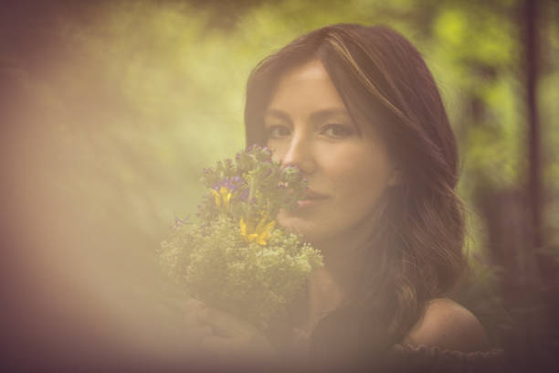 Woman is like a flower. Beauty woman in nature.