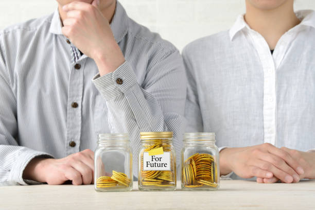 istock Couple thinking about saving money for future 1150024955