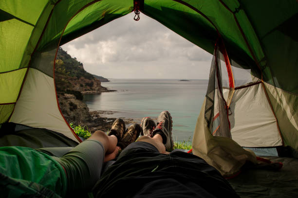 istock Seashore view from the tent with two people inside 1150028976