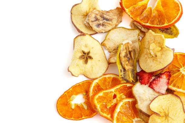 istock dried oranges,bananas and apples on white isolated background 1150034085