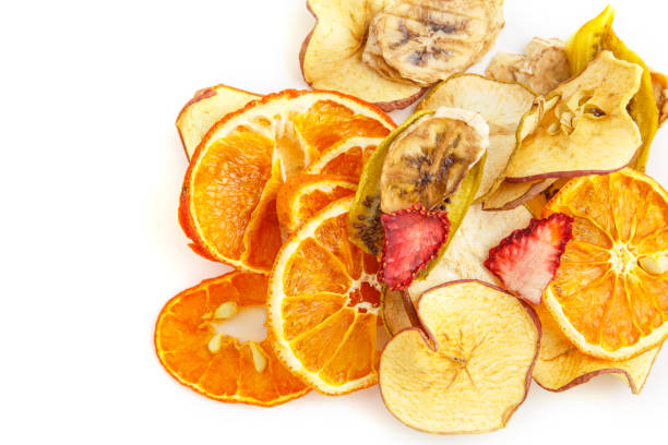 istock dried oranges,bananas and apples on white isolated background 1150034095