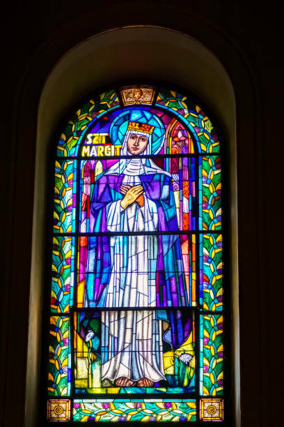 Budapest, Hungary - July 9, 2015: Stained glass portrait of Szt. Margit inside St. Stephen's Basilica, Budapest, Hungary.