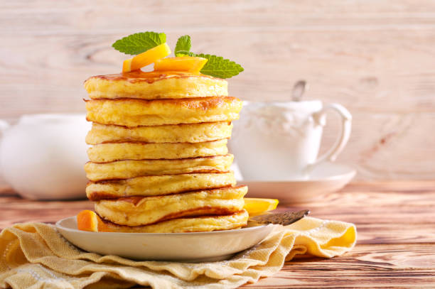 istock Pile of pancakes with honey 1150039137