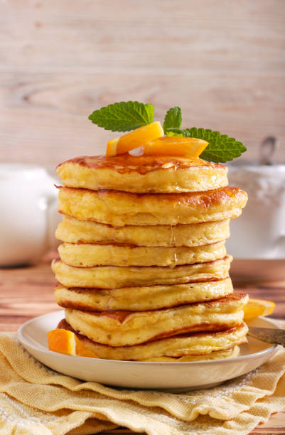istock Pile of pancakes with honey 1150039384