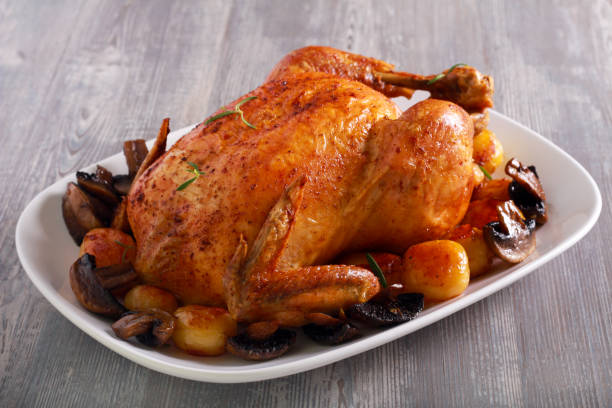 istock Roast chicken with potatoes and mushrooms 1150040066
